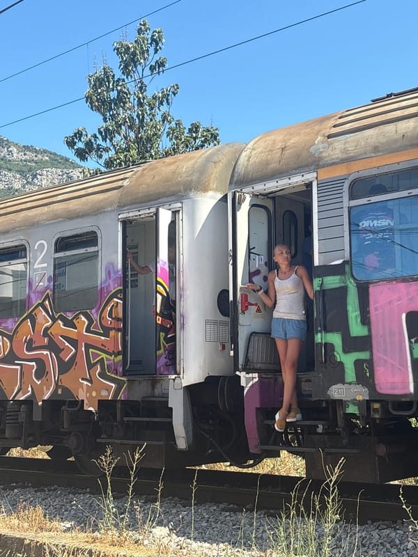 Idle train car on a gravel track in Bar, Montenegro