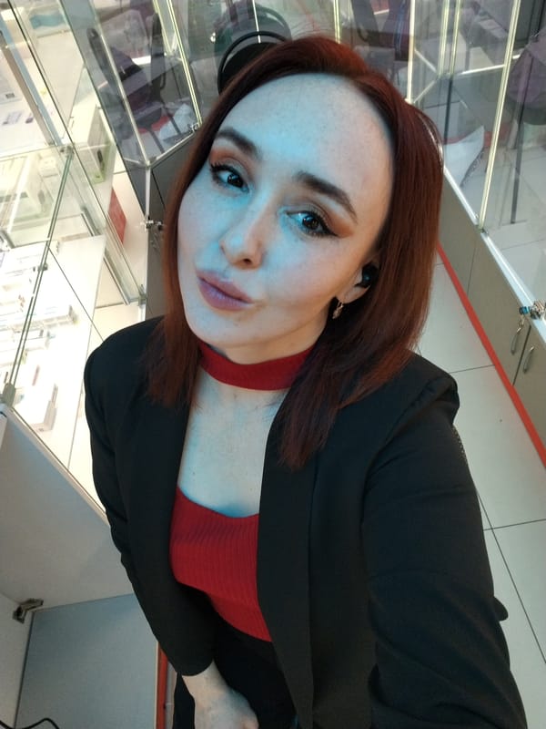 Woman takes selfies in commercial space in Izhevsk