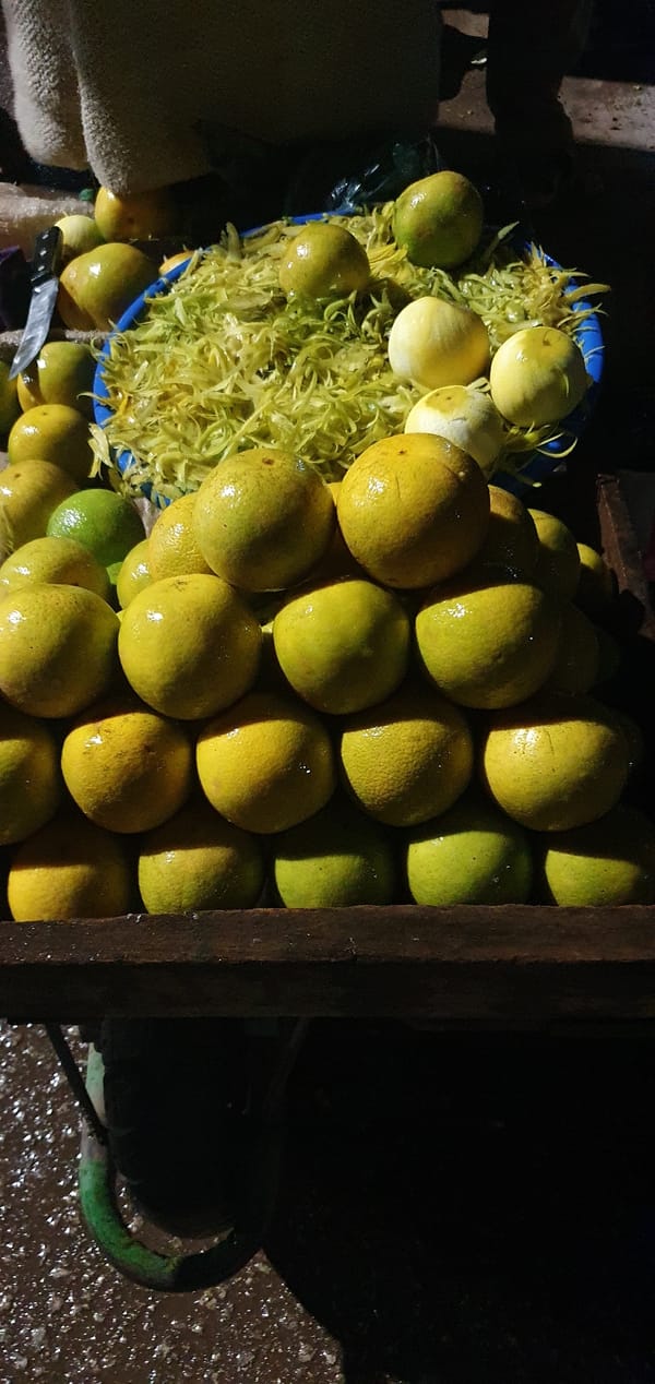 Fresh citrus on display at a Bukuru market stall