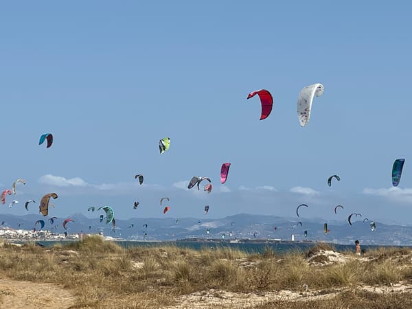 Busy kite beach day in Tarifa, Spain