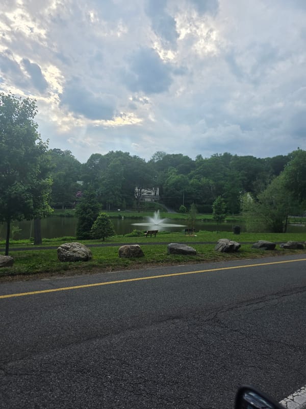 Evening documentation of New Rochelle park fountain and residential area