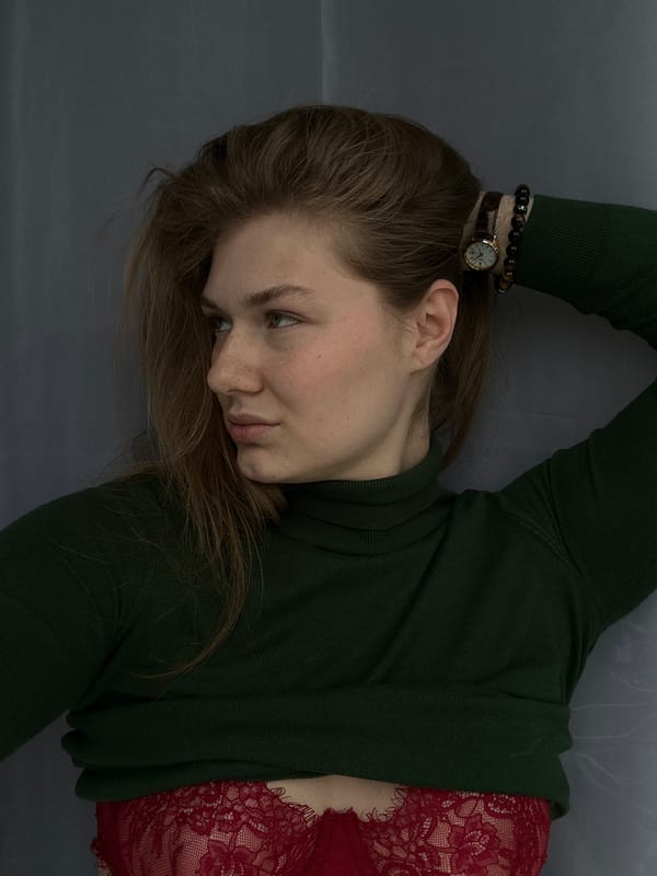 Woman resting indoors captured in casual moment in Kazan