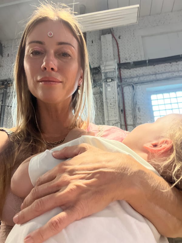 Indoor Moscow session: dressed up, holding a sleeping child