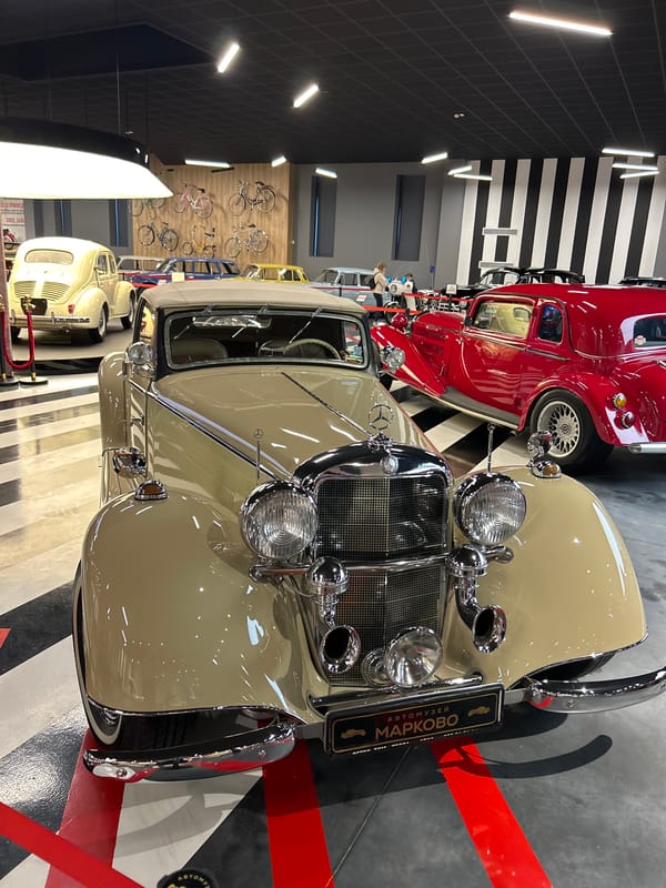 Visitor documents vintage vehicle collection at Bulgaria auto museum