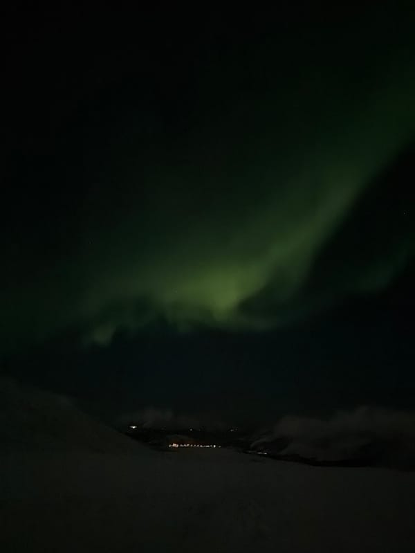 Aurora borealis displays captured over Tromsø from multiple perspectives