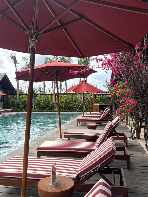 Poolside meditation moment captured in Kuta Selatan resort area