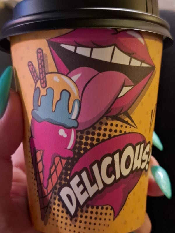 Evening stroll captures illuminated Novi Sad architecture and refreshments