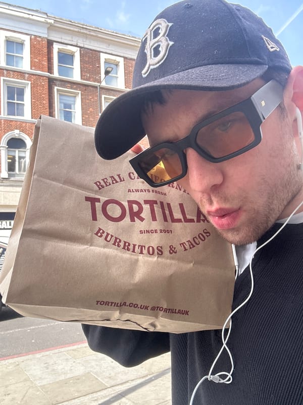 Man photographed carrying takeout bag on London sidewalk