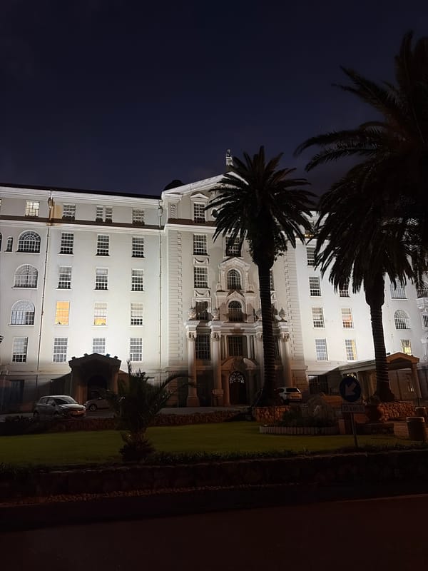 Illuminated building observed at night in Cape Town