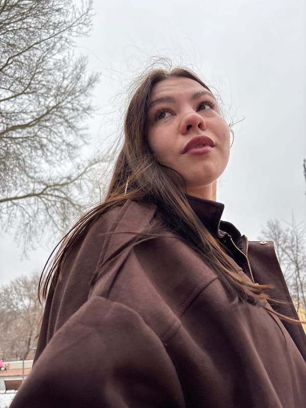 Portrait of contemplative young woman photographed in Perm