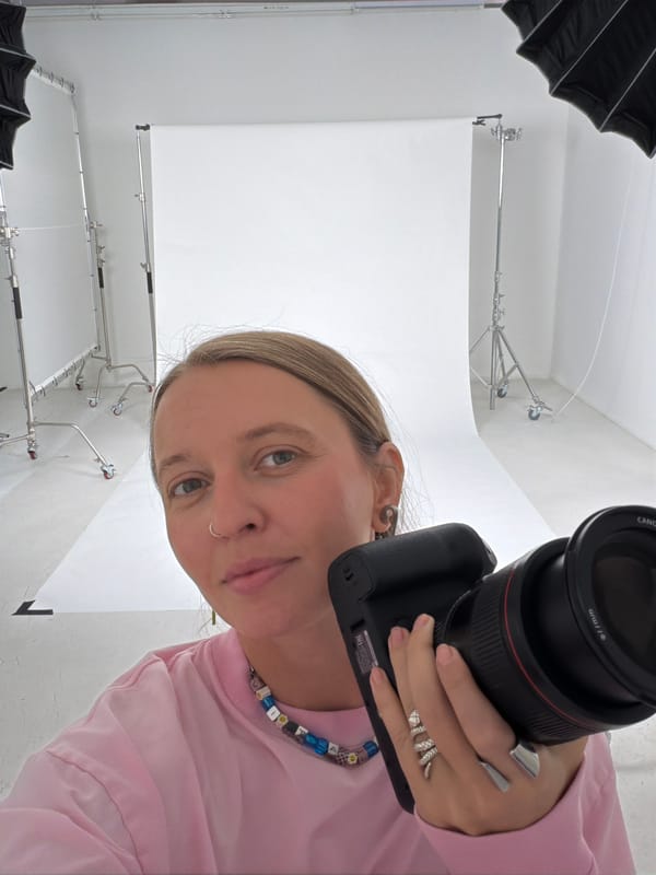 Woman takes selfie in Los Angeles photography studio