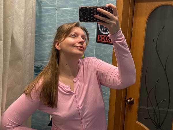 Woman documents evening skincare routine in Izhevsk bathroom