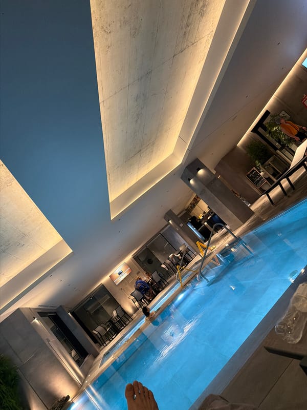Evening scene at modern indoor pool facility in Burgas