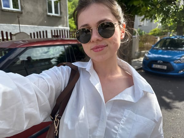 Tourist captures selfies and street scenes in Karlovy Vary
