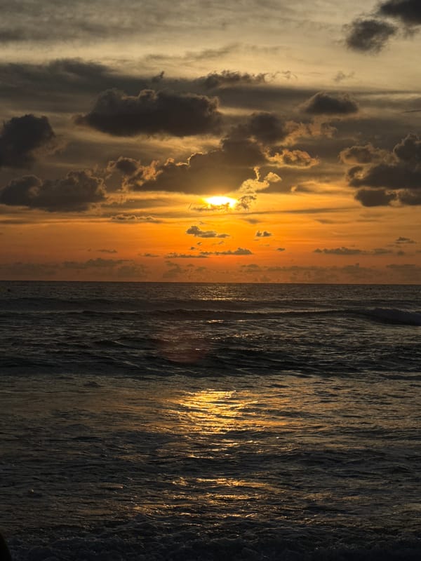 Sunset beach activities at Karon Beach, Thailand