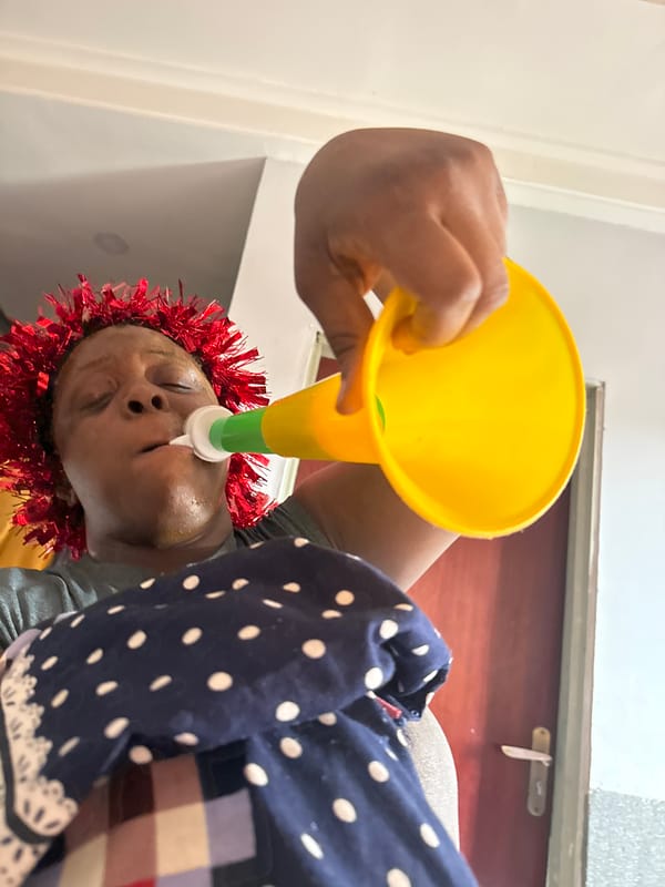 Person receives substance through funnel in Sabon Tasha