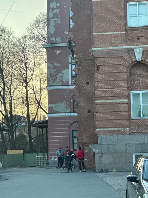 Street scene documented in Saint Petersburg showing mixed-surface building