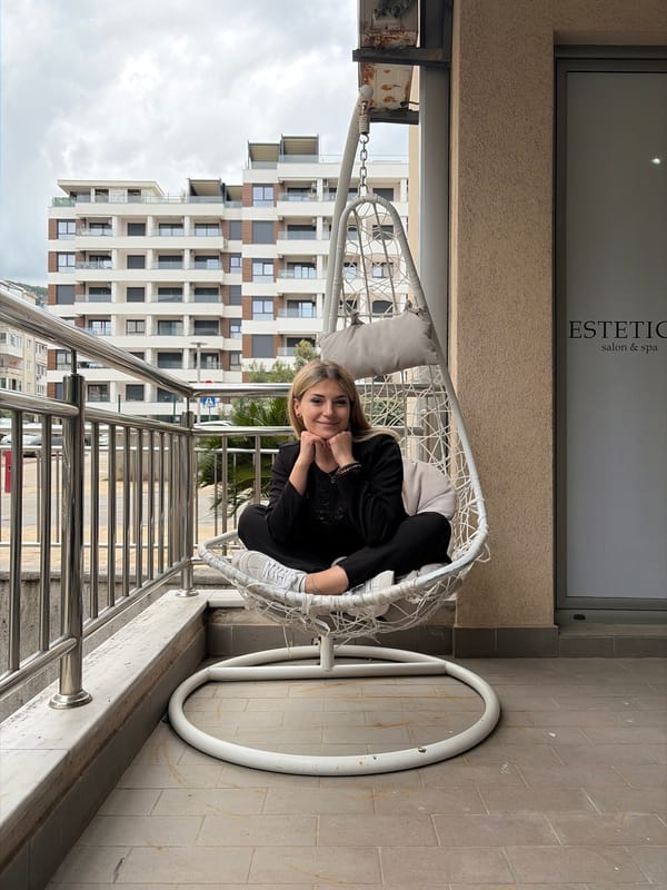 Woman enjoys afternoon relaxation session in Budva, Montenegro