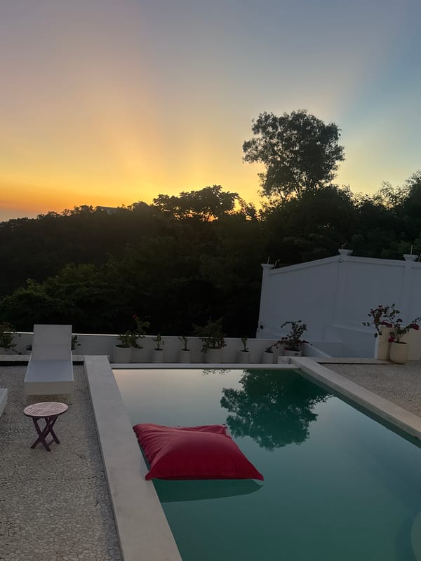 Peaceful poolside evening captured in Kuta Selatan at dusk