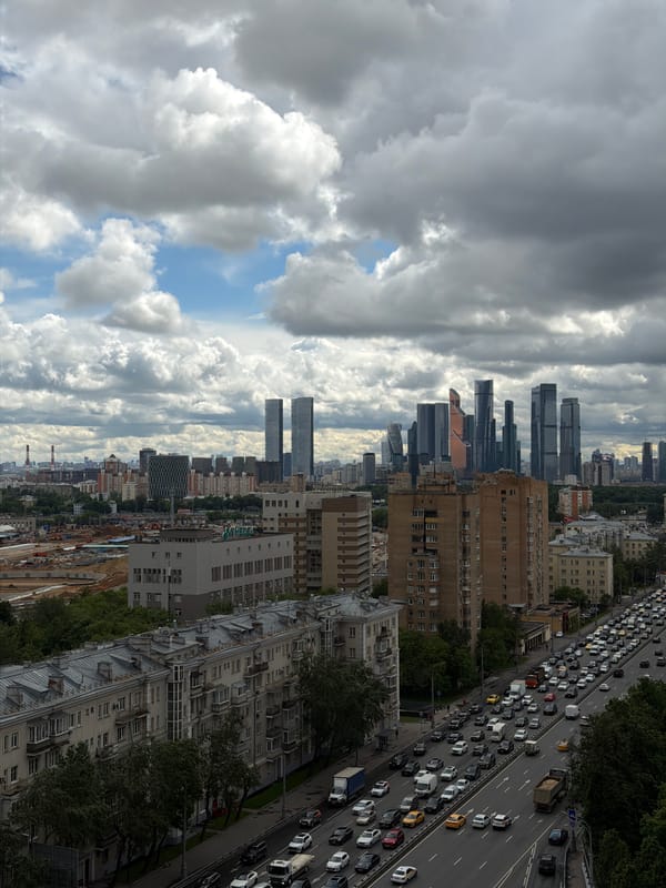 Storm clouds gather over Moscow skyline near Triumph Palace
