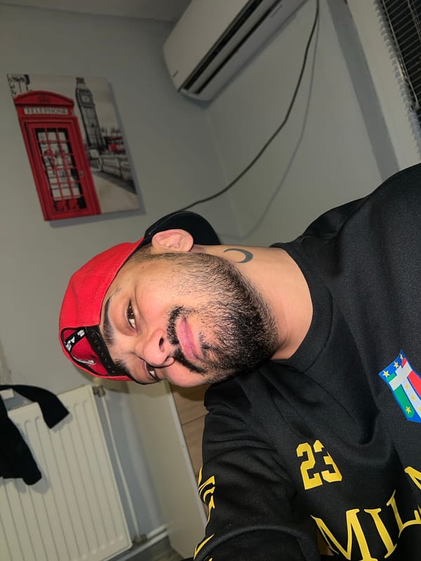 Man poses indoors in Shumata, Bulgaria room