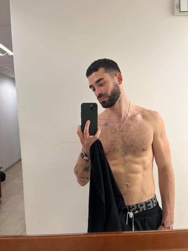 Man takes shirtless mirror selfie in Sofia