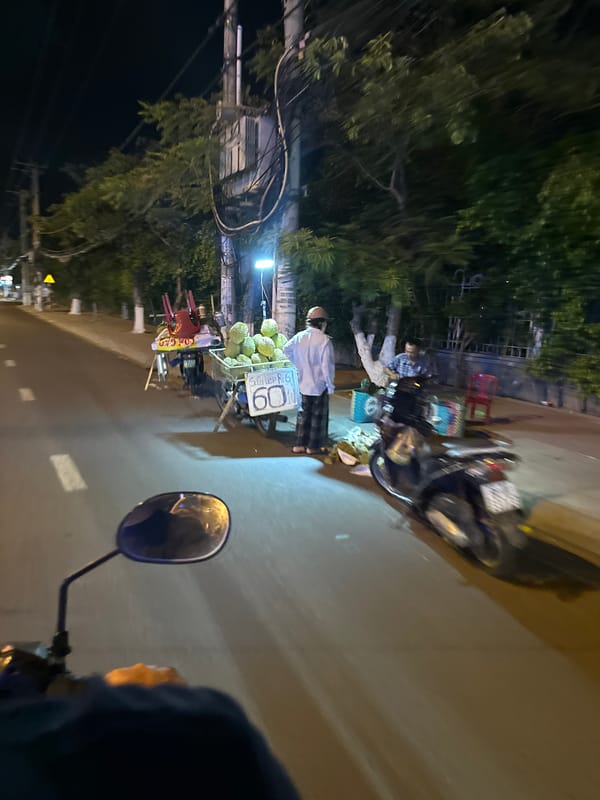 Nighttime street scenes captured by motorbike rider in Vietnam