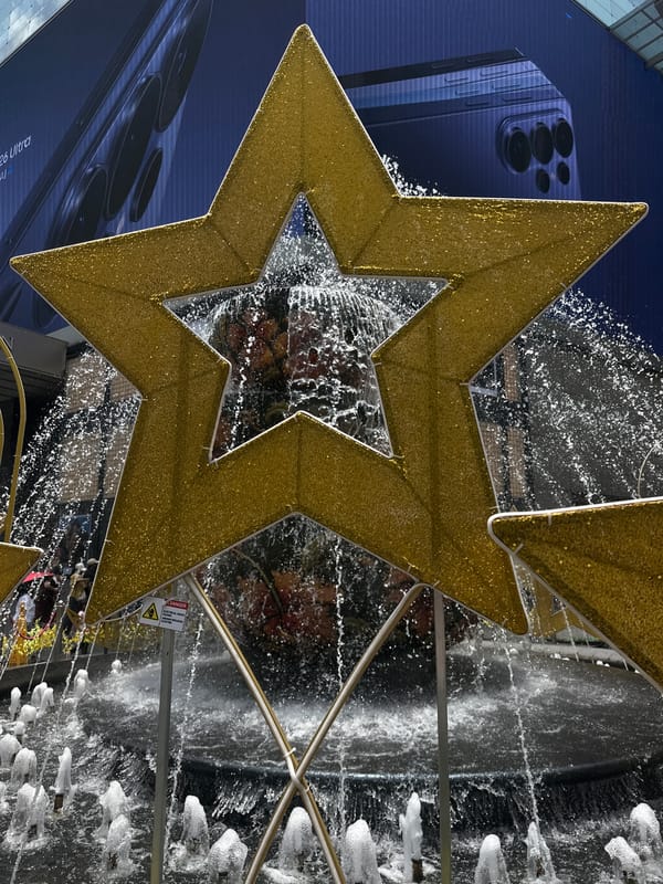 Golden star fountain display at Pavilion shopping mall