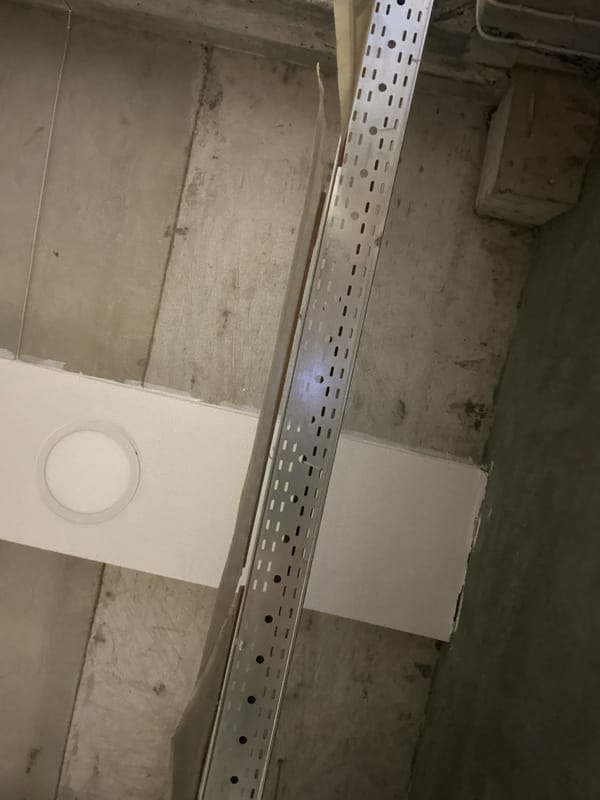 Indoor construction site scenes captured during morning hours