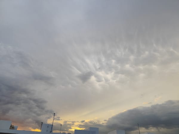Dramatic cloud formations observed over Playa del Carmen rooftops