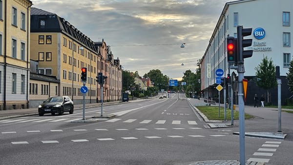 Evening streets of central Linköping, cathedral anchoring the skyline