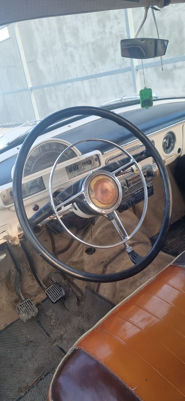 Vintage car interior and rusted parts documented in Ukraine