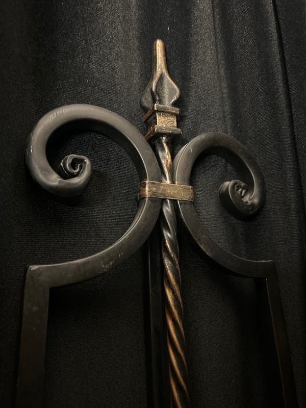 Ornate metal object with scrollwork observed in Cape Coral