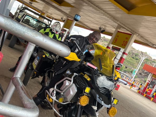 BMW motorcyclist makes routine fuel stop at Nigerian gas station