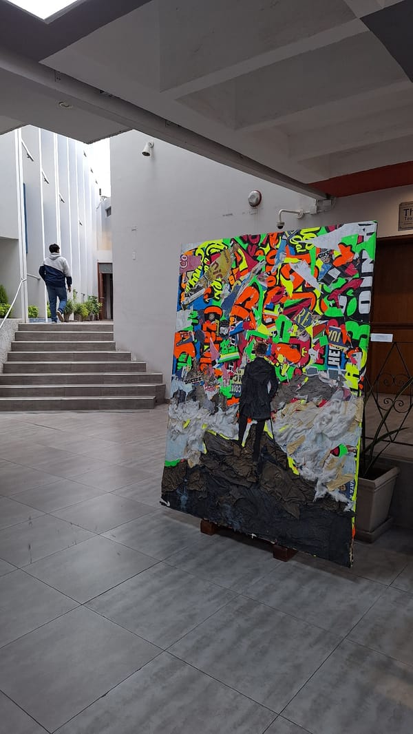 Mixed-media textile artwork displayed outdoors in Arequipa, Peru
