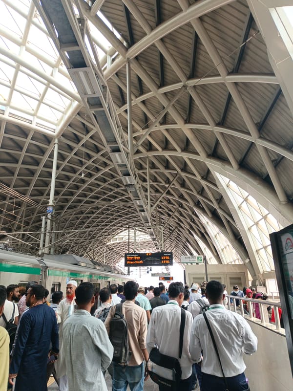 Morning commuters gather at Dhaka station for Uttara North train