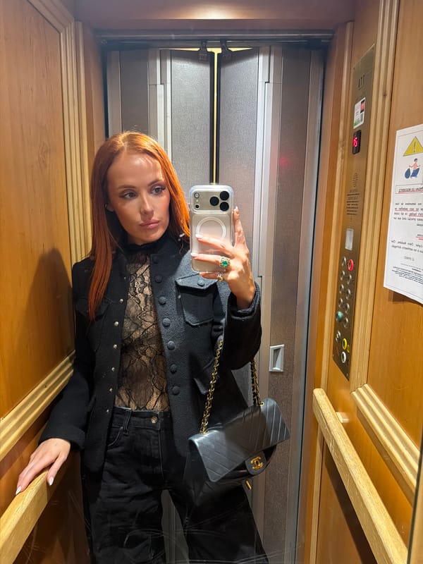 Woman Takes Selfie in Paris Elevator