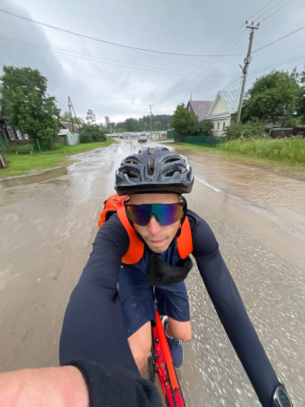 Cycling through flooded rural roads in Chaikovsky, Russia