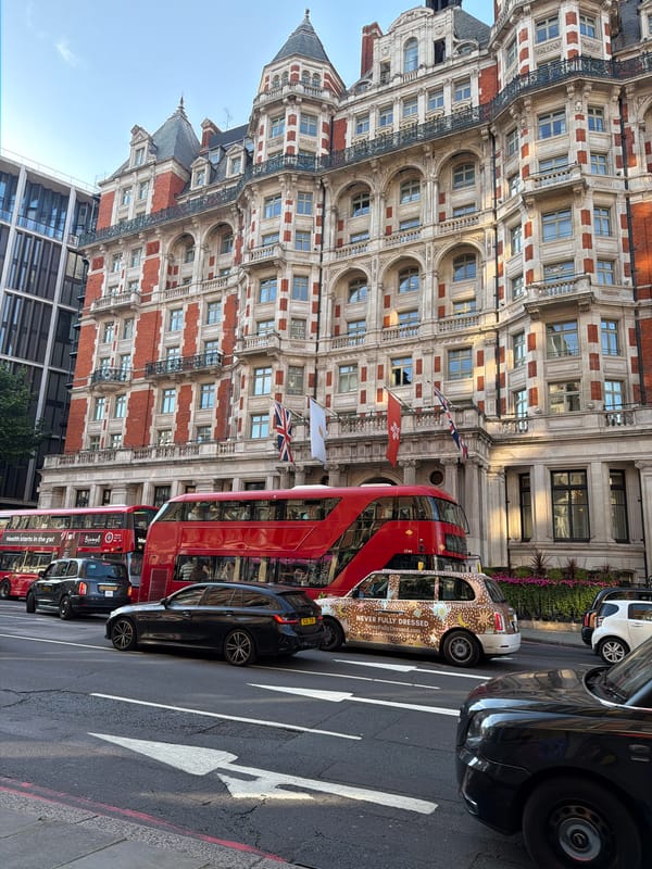 High-floor London views and street level on a clear afternoon