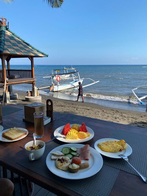 Beachfront breakfast spread in Buleleng with ocean views