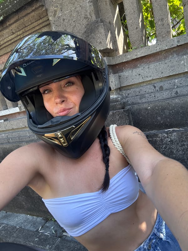 Scooter ride through North Kuta's palm-lined streets and stone gates