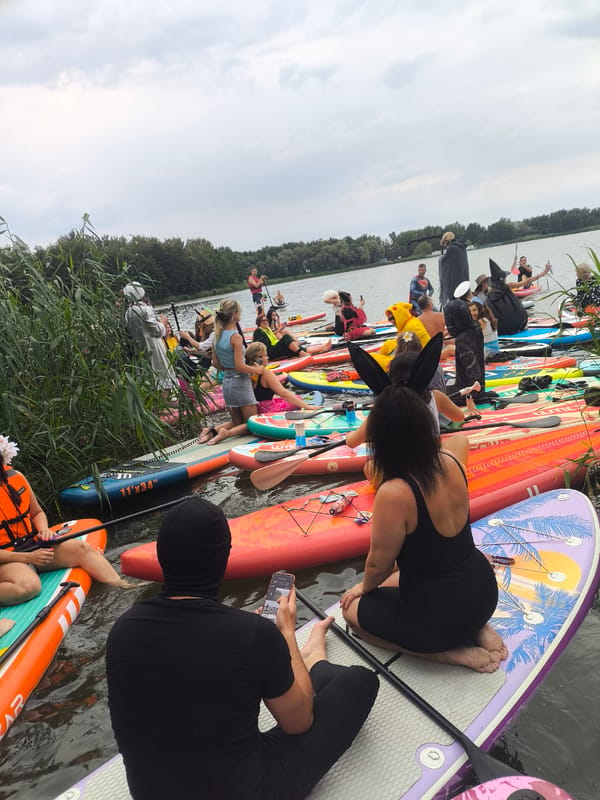 Costumed paddleboarders take over a Kaliningrad waterway
