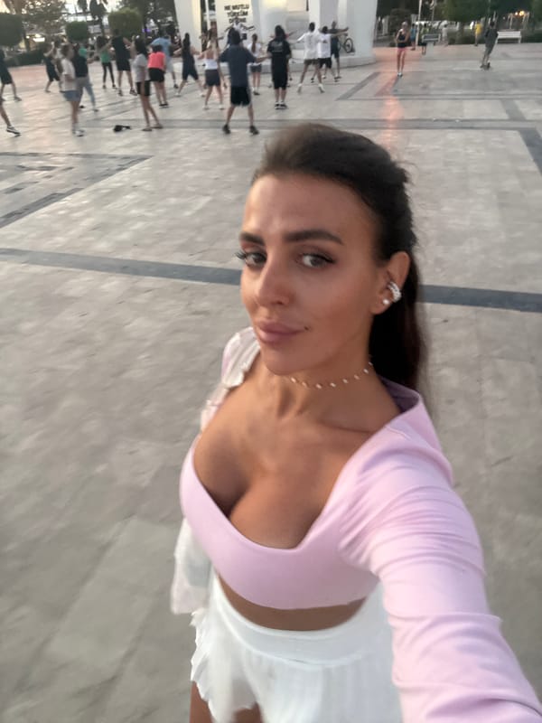 Selfies and an outdoor fitness class share a Fethiye plaza