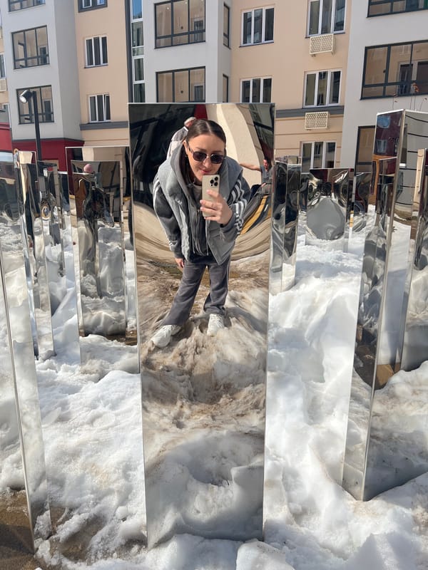 Woman documents winter day at residential complex with children playing