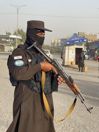 Taliban security forces patrol Kandahar streets with rifles