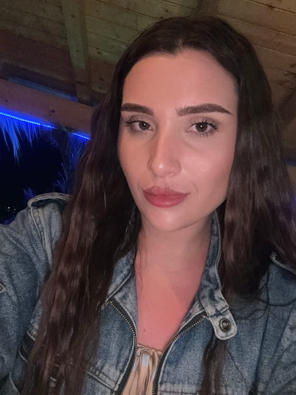 Evening selfie session at a neon-lit bar in Primorsko, Bulgaria