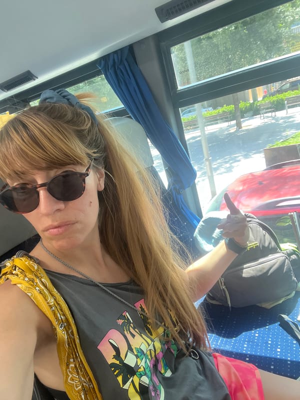Travel photos and peace signs on bus in La Llagosta