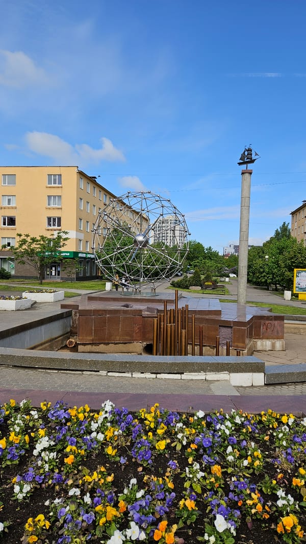 Morning urban walk captures city sculptures and monuments