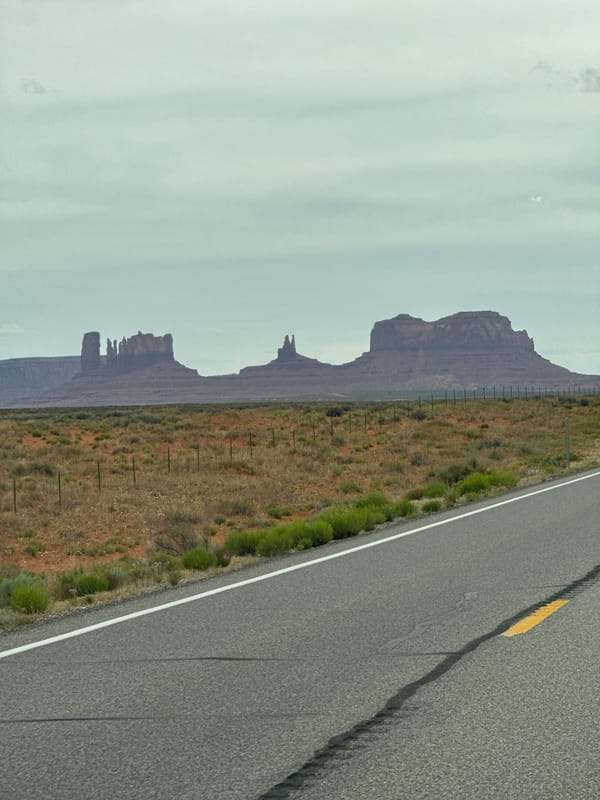 Vehicle journey through Monument Valley desert highway documented