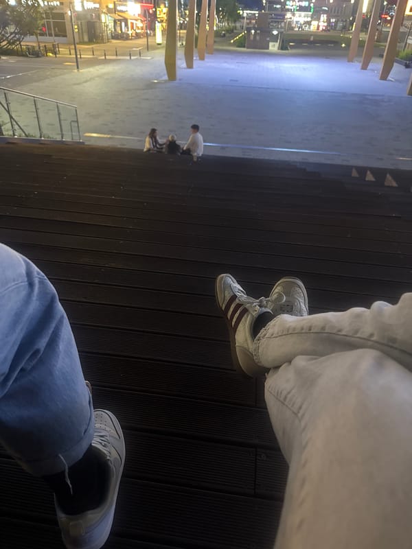 Two women enjoy evening outing on wooden platform in Gimpo-si